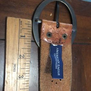 Wide brown American eagle belt.